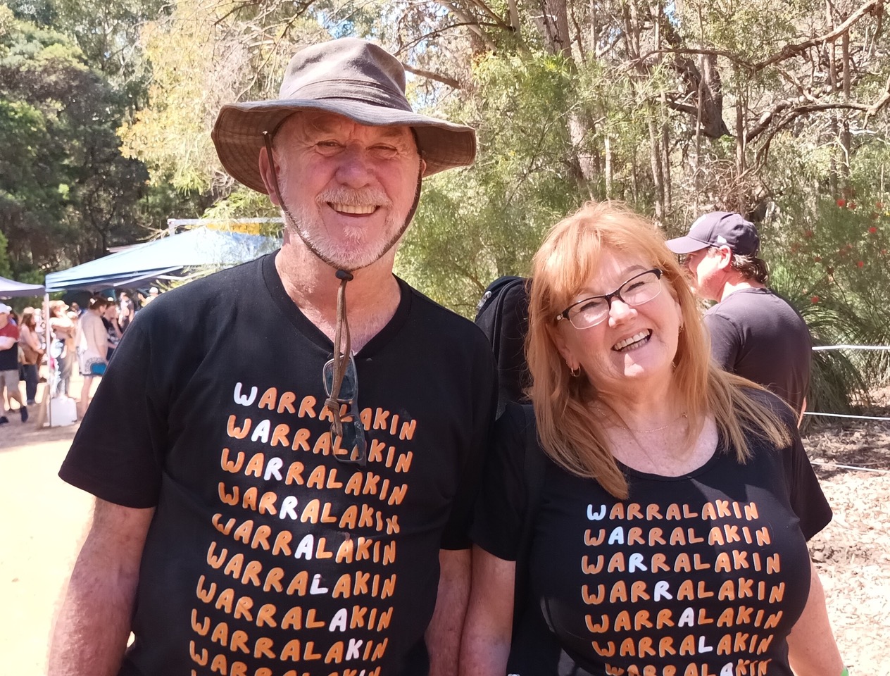 The two members of Warralakin stand smiling